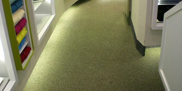 Quartz green flooring in a Lacoste retail store