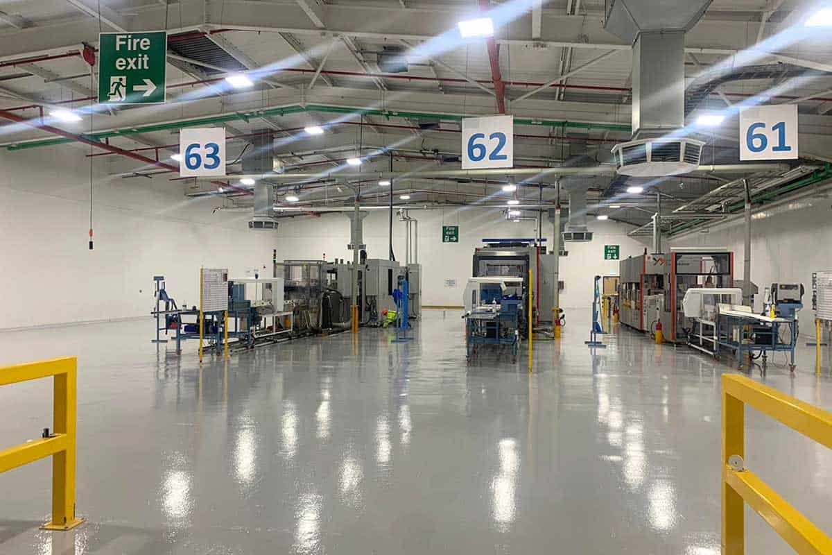 Grey resin floor repaired in warehouse
